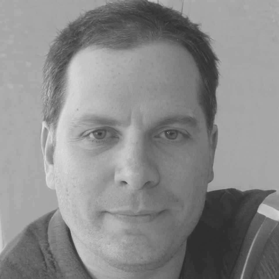 Viktor Novak reviewing student lighting setups